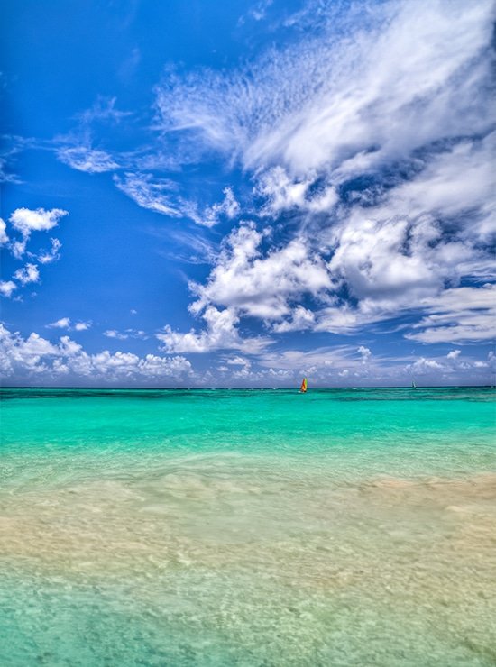 punta cana green blue beach and sea with beautifull sky sunshine