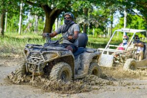 4x4 ATV Adventure in Punta Cana: Cave & Dominican Culture - Getting on the right ATV: safety briefing and setup at the ranch