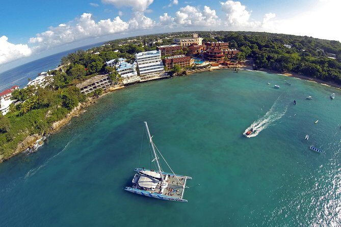 Catamaran Snorkeling All-Inclusive Day-Trip - Stop 1 around Tip Top Catamaran Tours: a calm start in Sosua Bay