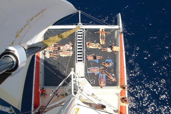 Catamaran Snorkeling All-Inclusive Day-Trip - Lunch onboard: buffet food, beverages, and how the atmosphere shifts