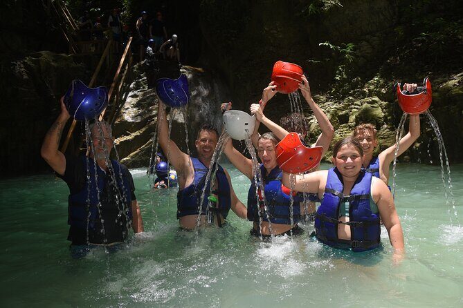 Excursion in Damajagua's 7 Waterfalls With Food Included DR! - Gear and footing: helmets, life vests, and the “don’t wear sad shoes” warning