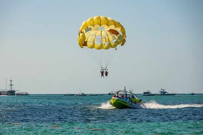 PACKAGE DEAL Catamaran- Snorkeling - Hooka Diving - Parasailing - Open Bar, Music, and That Cocktail Moment