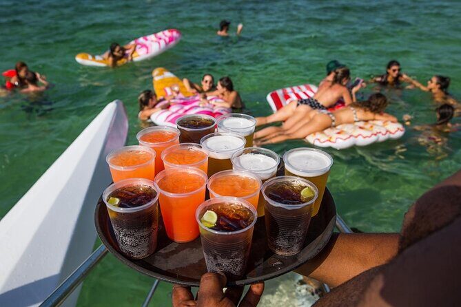 Party Boat /View Dolphins / Snorkling /Free Drinks and Transportation - Booking Value: Is $57 Worth It on a Party Boat Day?