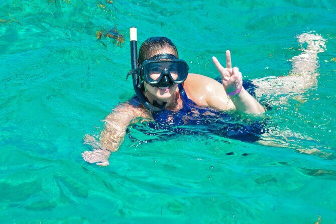 Private Catamaran wonderful Snorqueling slide & entartaiment team - Aquarium and dolphin viewing from the catamaran