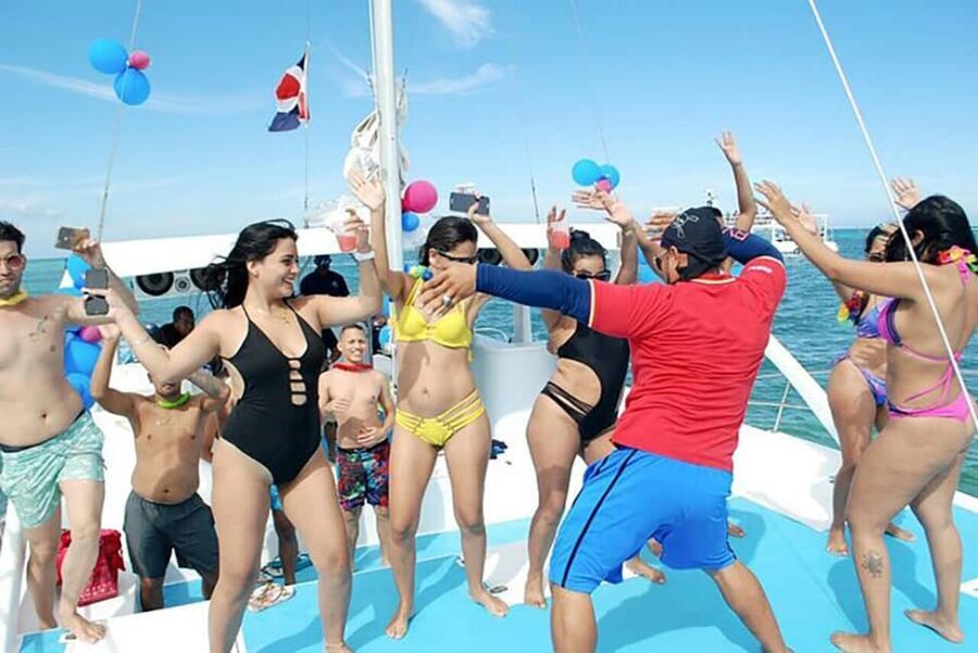 Punta Cana: Catamaran Boat Party with Unlimited Drinks - Getting on the Boat: Pickup, Boarding, and Meeting the Crew