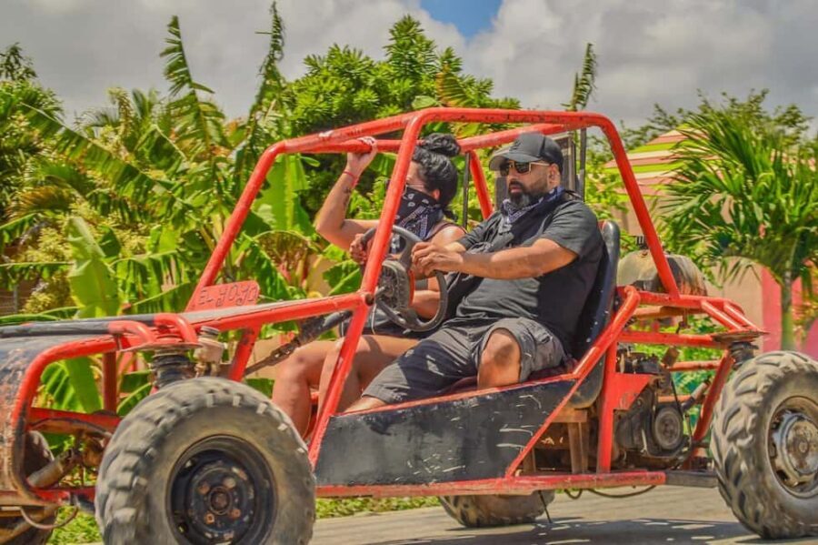 Punta Cana: Countryside and Macao Beach Half-Day Buggy Tour - Macao Beach time: cliffs, waves, and the payoff