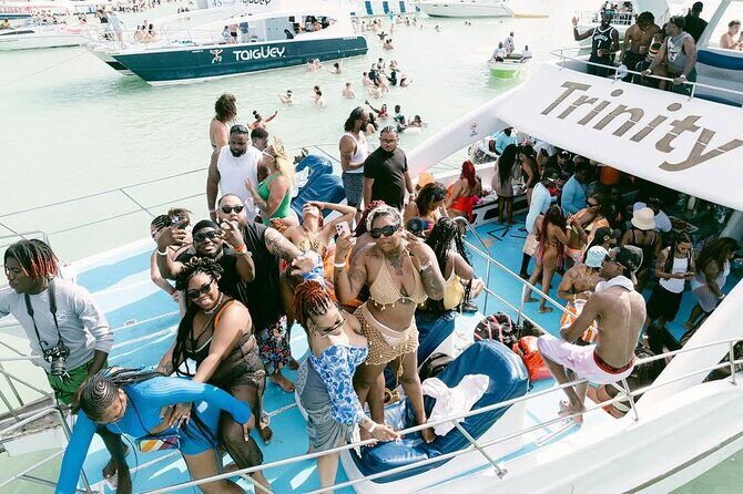 Punta Cana Hip Hop Party Boat with Open Bar *Adults Only - Stop 2: Dolphins Island Photo Moments (No Need to Stress)