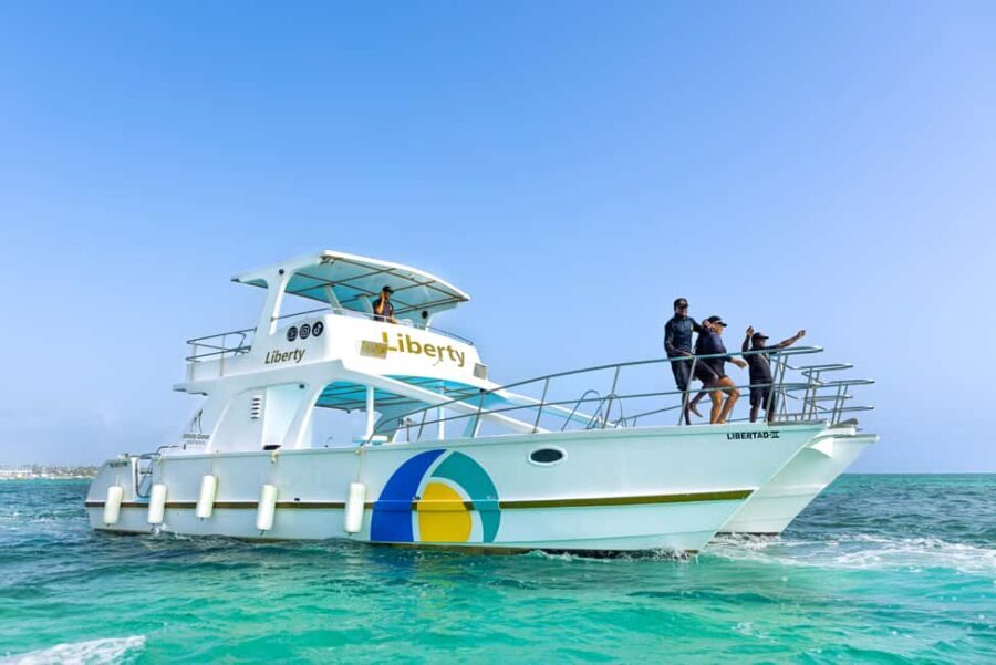 Punta Cana Party Boat (Adults only) - Snacks and beach time: nachos with sauce and fruit, plus what to bring