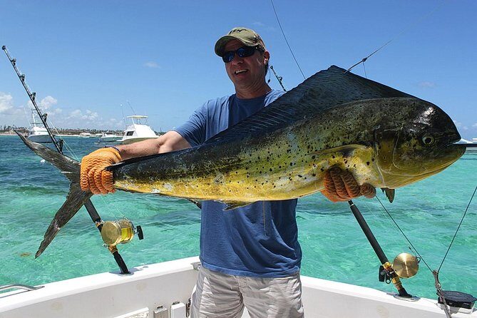 Punta Cana Private Fishing Charter on 39 Foot Boat with Bevarages - The catch, the fillet, and getting it cooked back on land