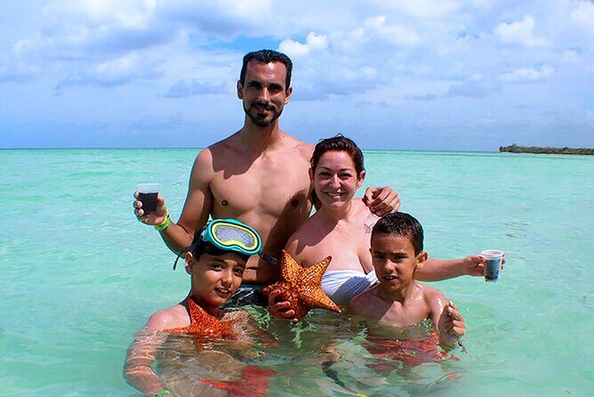 Saona Island Full Day Excursion from Punta Cana - Return by catamaran: drinks, snacks, music, and the party effect