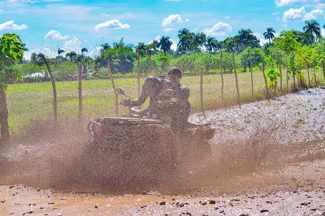 Tour Moto ATV en Punta Cana, Playa, Cueva Taína y Casa Dominicana - Stop 1 at the Mud Race Ranch: Ecology Adventure Tour